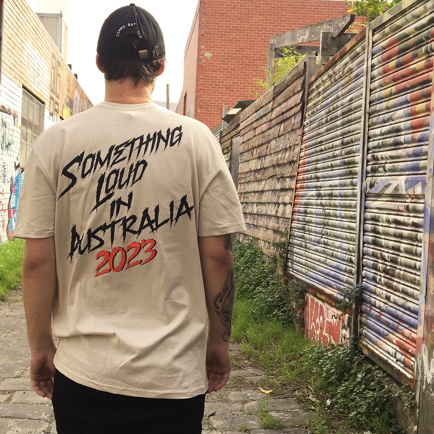 Jimmy Eat World - Something Loud In AUS Tee (Sand)